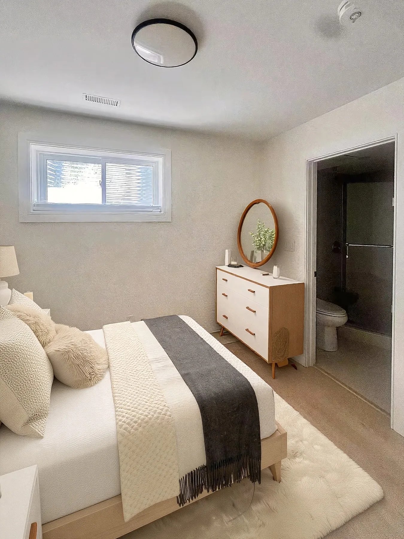 Lower-level bedroom with ensuite